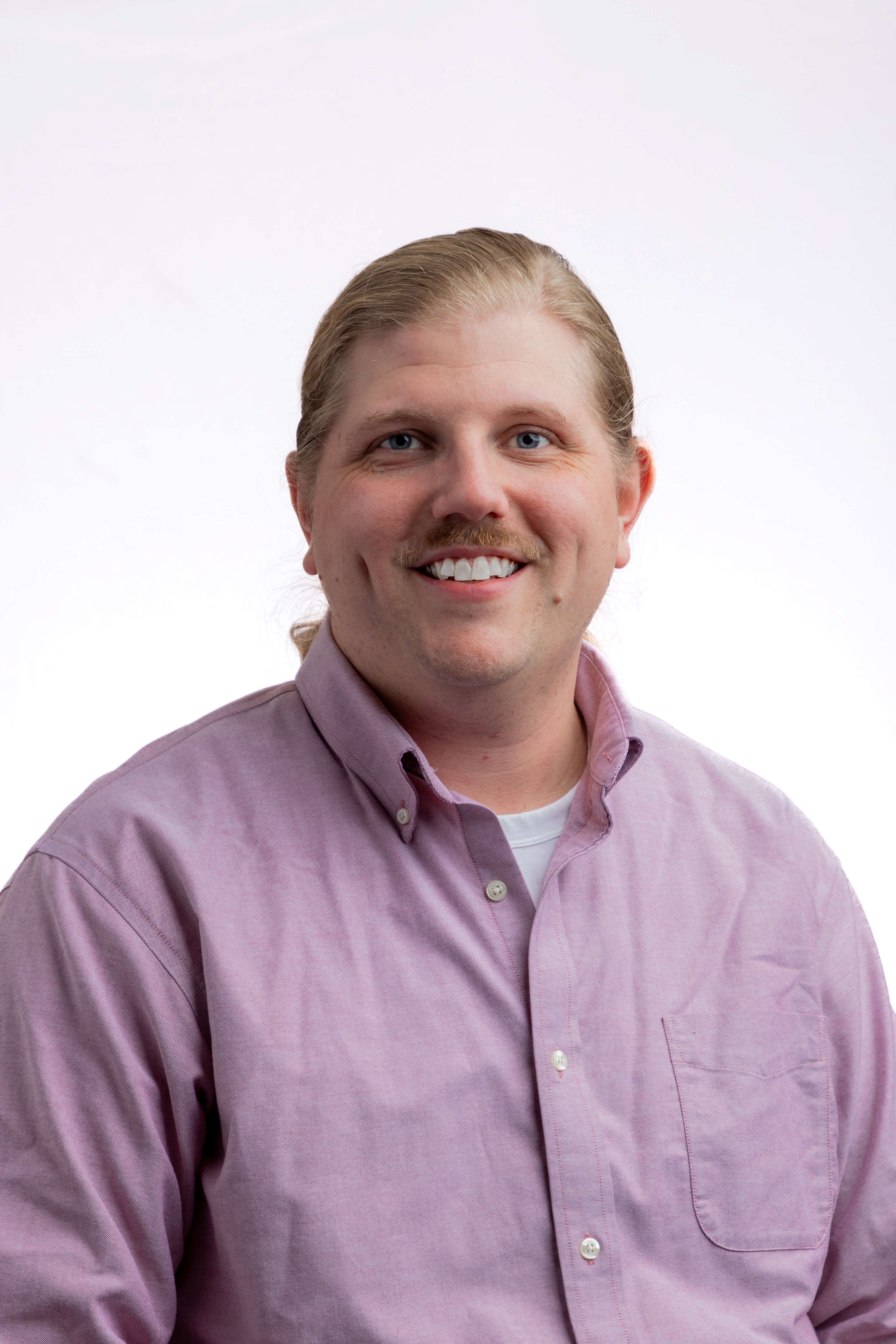 Advisor in purple shirt with blonde hair